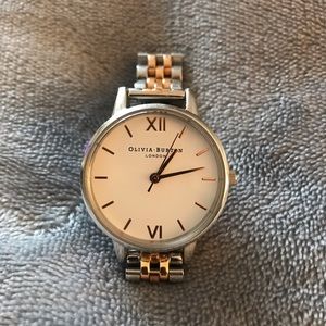 Women’s Olivia Burton two tone.